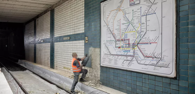 Construction worker at a wall