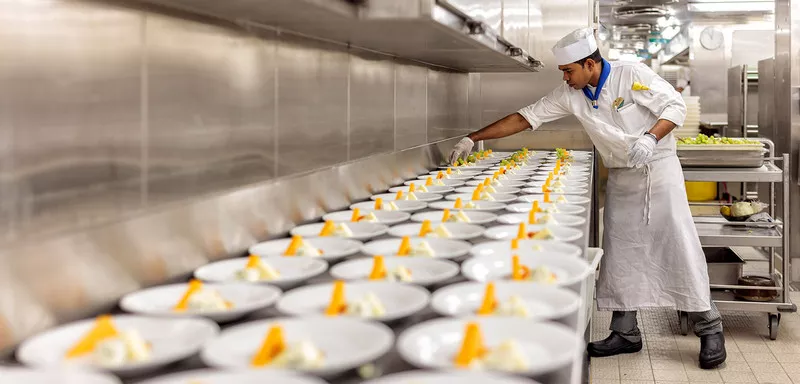 Chef prepares multiple meals