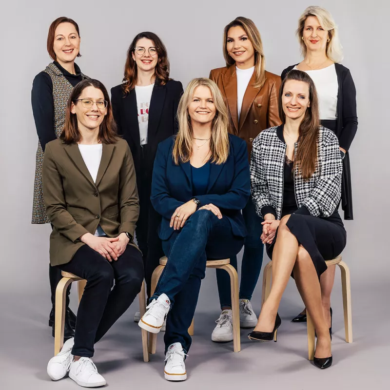 Portrait shot of assistant colleagues smiling at the camera