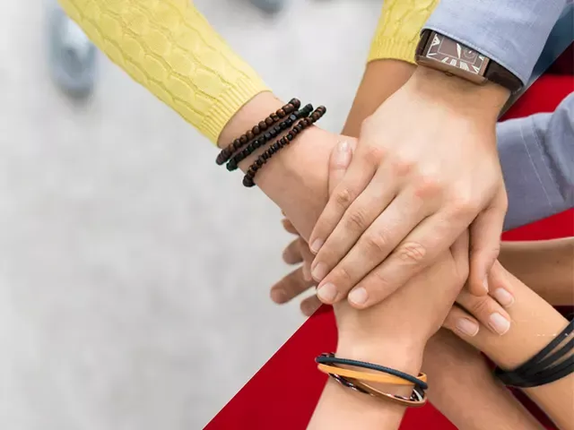 all hands on one; symbol of sticking together