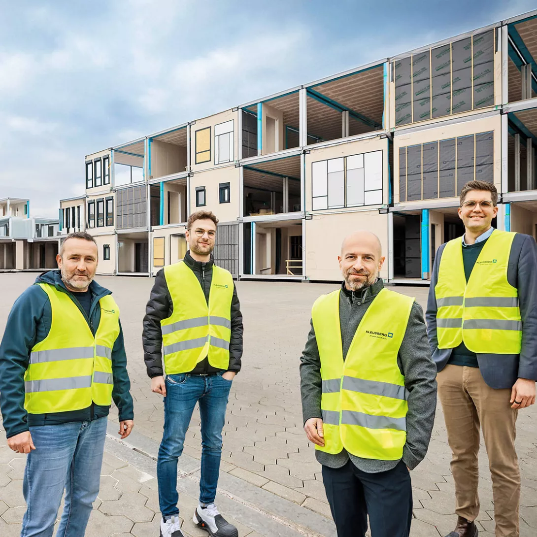 Top of the class: Kleusberg’s plant director Jörg Draschner, product development head Jonas Beuth, and CEO Oliver Hartmann (from left) with consultant Tobias Michels from Porsche Consulting want to cut construction times from years to three months.
